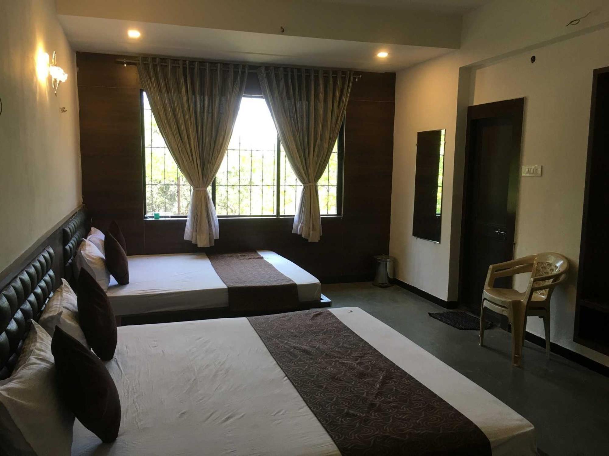 Liva Rooms Nashik Buitenkant foto
