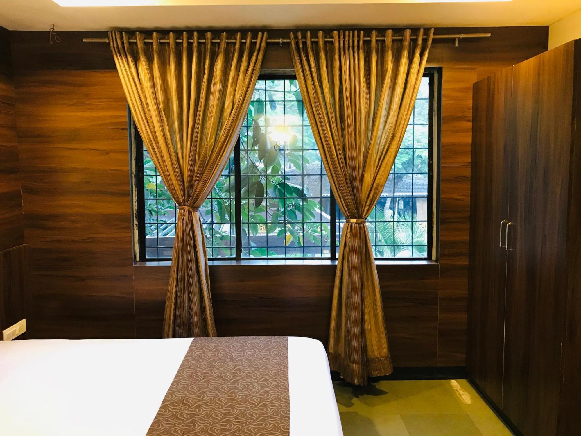 Liva Rooms Nashik Buitenkant foto